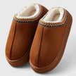 House shoes for women cushioned slip on slippers worn in a bright living room