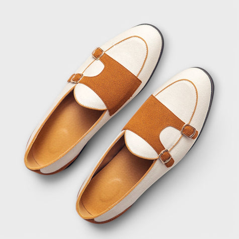 Suede slippers for women slip on mules with gold buckle on a wood floor