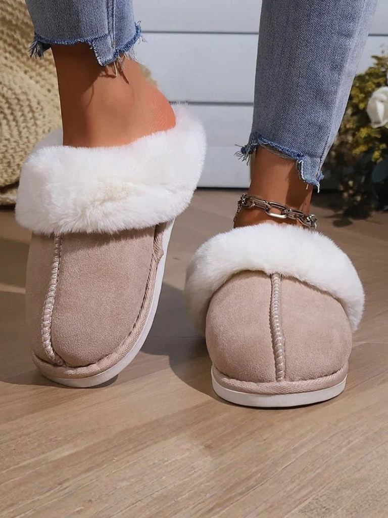 Fuzzy slippers for women fluffy closed toe house slippers by a fireplace