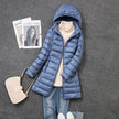 Long puffer coat for women in Blue