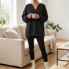 Oversized V neck tunic sweatshirt for women worn with leggings, front view