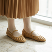 Women's ballet flats with arch support, woven slip-on flats worn with a midi skirt