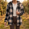Women's checked hooded fleece jacket in black and beige, worn open