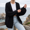 Women's oversized chunky knit open front cardigan in black, lifestyle